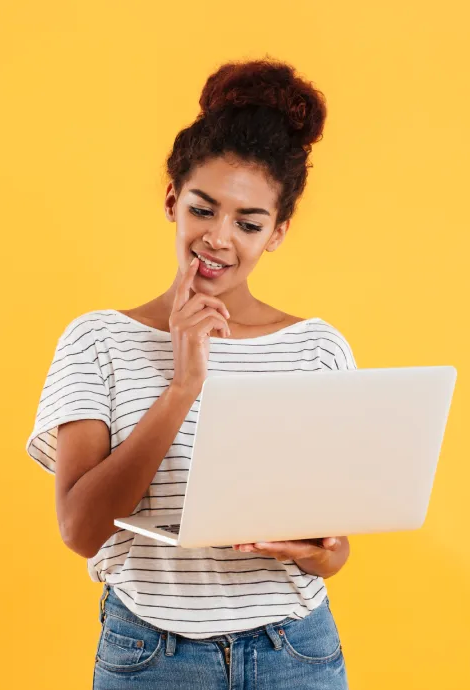 young-positive-cool-lady-with-curly-hair-using-laptop-isolated